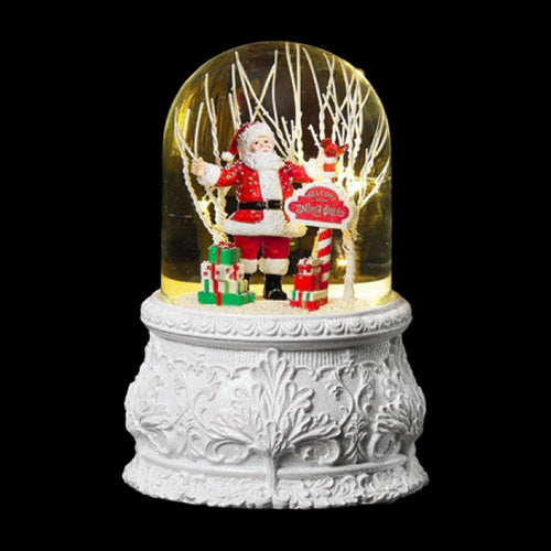 Santa With North Pole and Gifts Snow Globe - The Christmas Imaginarium
